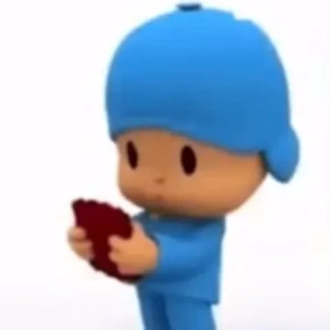 3D-персонаж Pocoyo в синем костюме рассматривает красный предмет.