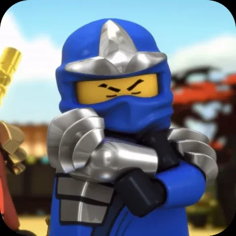 Анимация персонажа Джея из LEGO Ninjago в синем костюме и металлической броне, который стоит со скрещенными руками и сердито смотрит вперед.
