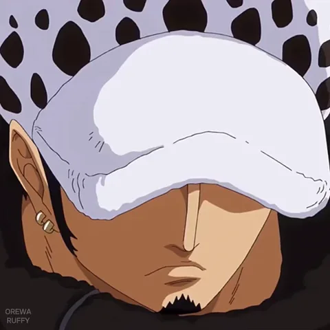 Анимация персонажа Ло из аниме One Piece, который поднимает голову и смотрит исподлобья.