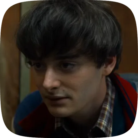 Анимация лица парня из сериала «Очень странные дела», который грустно или сосредоточенно смотрит вниз.