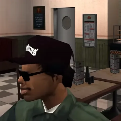 Анимация персонажа Каджи из игры GTA San Andreas. Он сидит за столом в баре и кивает головой.