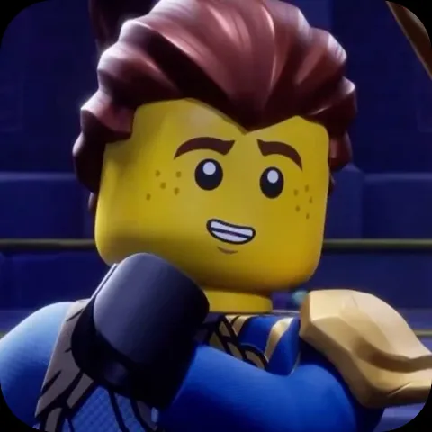 Анимация персонажа Джея из LEGO Ninjago, который пожимает плечами в синем костюме.