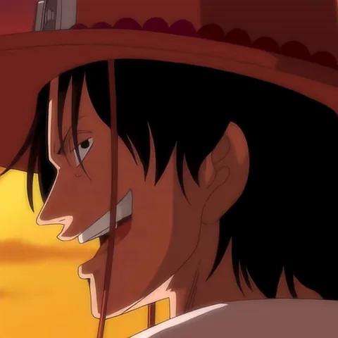 Анимация персонажа из аниме One Piece с черными волосами и веснушками в шляпе, который поворачивается к камере и улыбается на фоне заката.