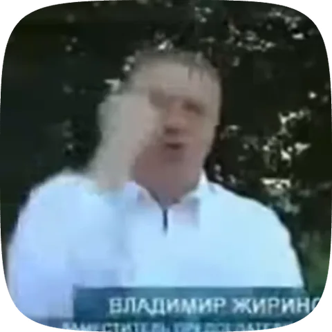 Стикер с мужчиной в светлой рубашке на фоне зелени, который показывает рукой жест «фига» (кукиш).