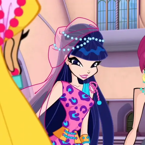 Фея Муза из мультсериала «Winx Club» разговаривает и улыбается.