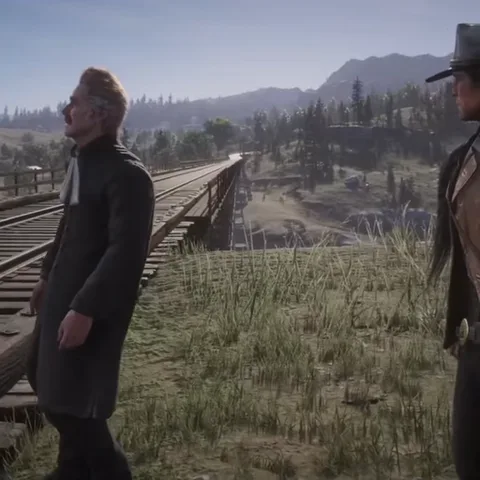 Анимация из игры Red Dead Redemption 2: мужчина в шляпе и длинном пальто падает спиной на траву рядом с рельсами.