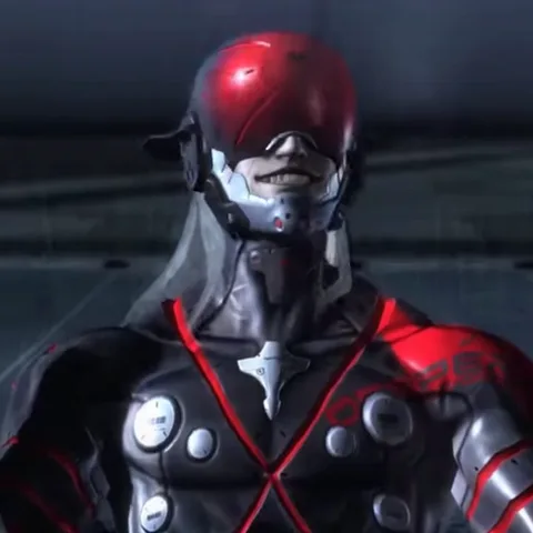 Анимация киборга Рейдена из игры Metal Gear Rising: Revengeance. Он медленно поворачивает голову в красной маске, выражая спокойствие и уверенность.