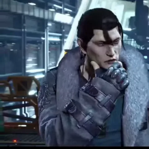3D-модель персонажа Сергея Драгунова из игры Tekken в серой куртке с меховым воротником и черных перчатках держит кулак у лица, демонстрируя задумчивость.