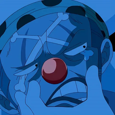 Анимация с персонажем Багги из аниме One Piece. Сначала он плачет в синем свете, потом улыбается, показывая сверкающий зуб.