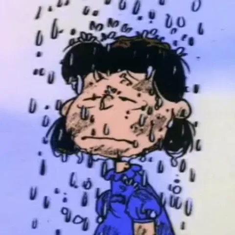 Анимация девочки из мультфильма «Гарфилд», которая стоит под сильным дождём и выглядит расстроенной.