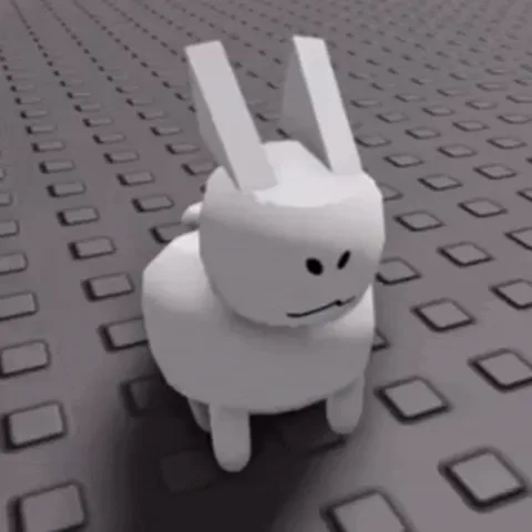 3D-анимация белого персонажа с кроличьими ушами, который теряет равновесие и падает на бок.