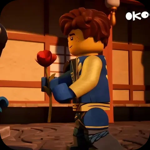Анимация персонажа Джея из LEGO Ninjago, который стоит боком и держит перед собой красную розу.