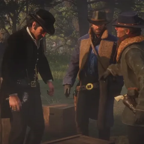 Анимация из игры Red Dead Redemption 2: ковбой в черном костюме беседует с двумя спутниками и садится на ящик.