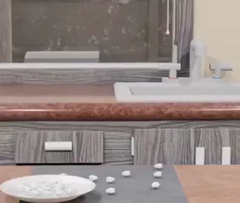 3D-анимация белого пушистого существа, которое сердито смотрит в камеру и сбрасывает тарелку с крошками на столешницу.