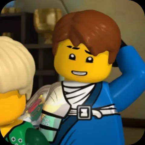 Анимация персонажа Джея из LEGO Ninjago, который смущенно улыбается и держит руку за головой.