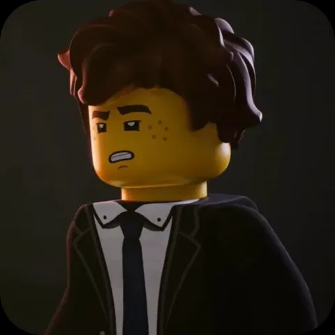 Анимация персонажа Джея из LEGO Ninjago в деловом костюме, который вяло покачивается головой и корпусом с недовольным лицом.