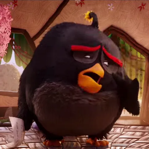 Анимация персонажа Бомба из игры Angry Birds, который читает бумагу и впадает в ярость.