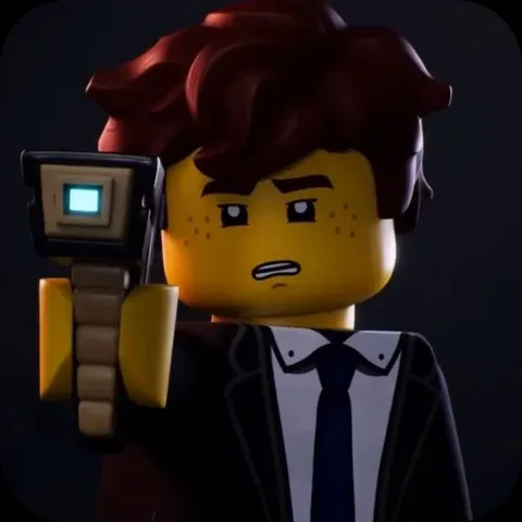 Анимация персонажа Джея из LEGO Ninjago в деловом костюме, который держит перед собой гаджет и моргает от удивления.
